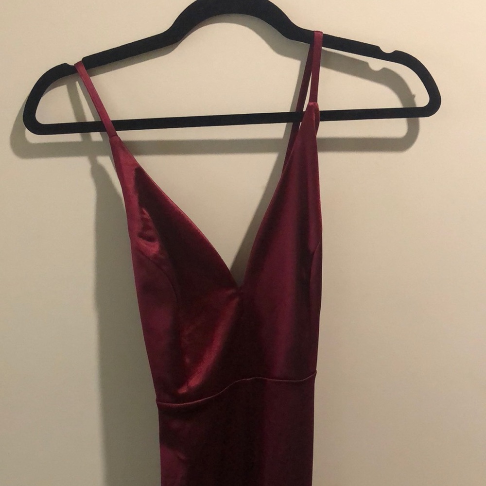 Burgundy tight prom dress with a slit
